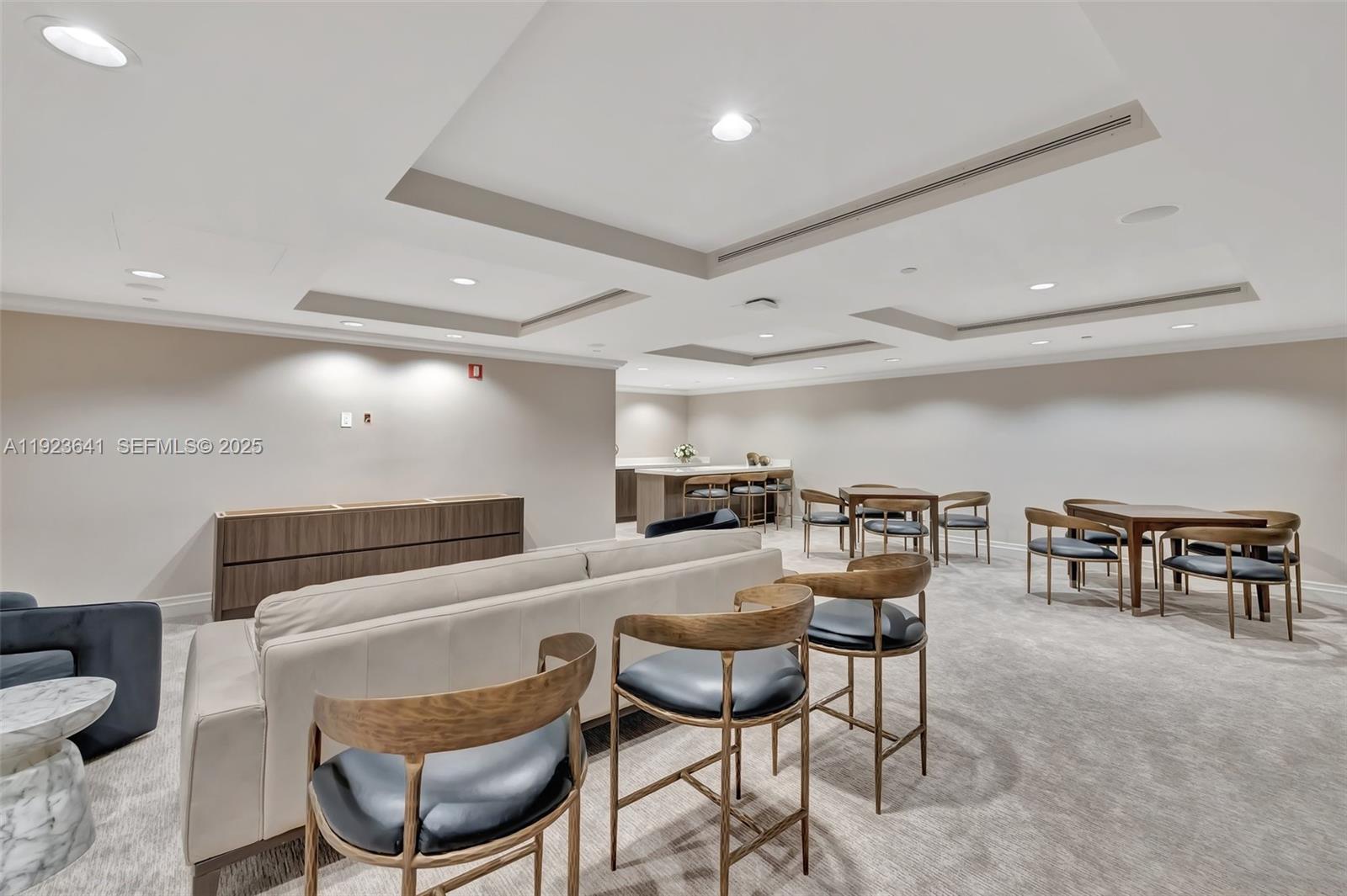 7000 Island Boulevard, Unit 1701 Aventura, FL 33160 - Photo 42 of 65 a dining room with furniture and a floor to ceiling window