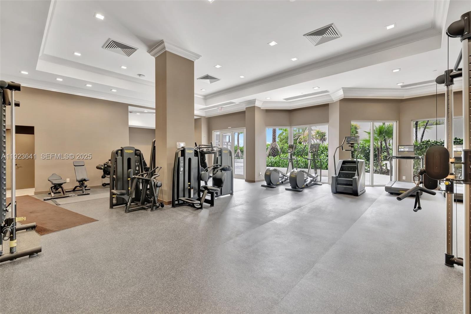 7000 Island Boulevard, Unit 1701 Aventura, FL 33160 - Photo 43 of 65 a view of a room with gym equipment
