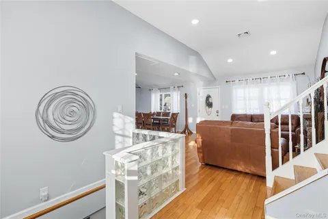 a kitchen with cabinets appliances a sink and a window