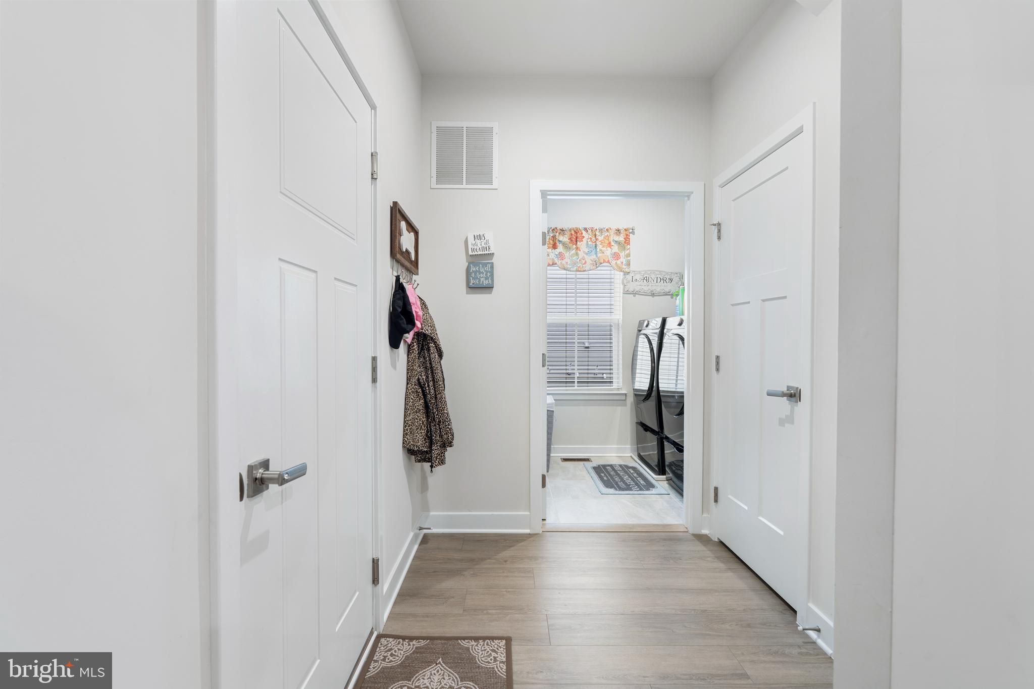 952 Swilken Bridge Road Aberdeen, MD 21001 - Photo 20 of 39 a view of a hallway with closet and a couch