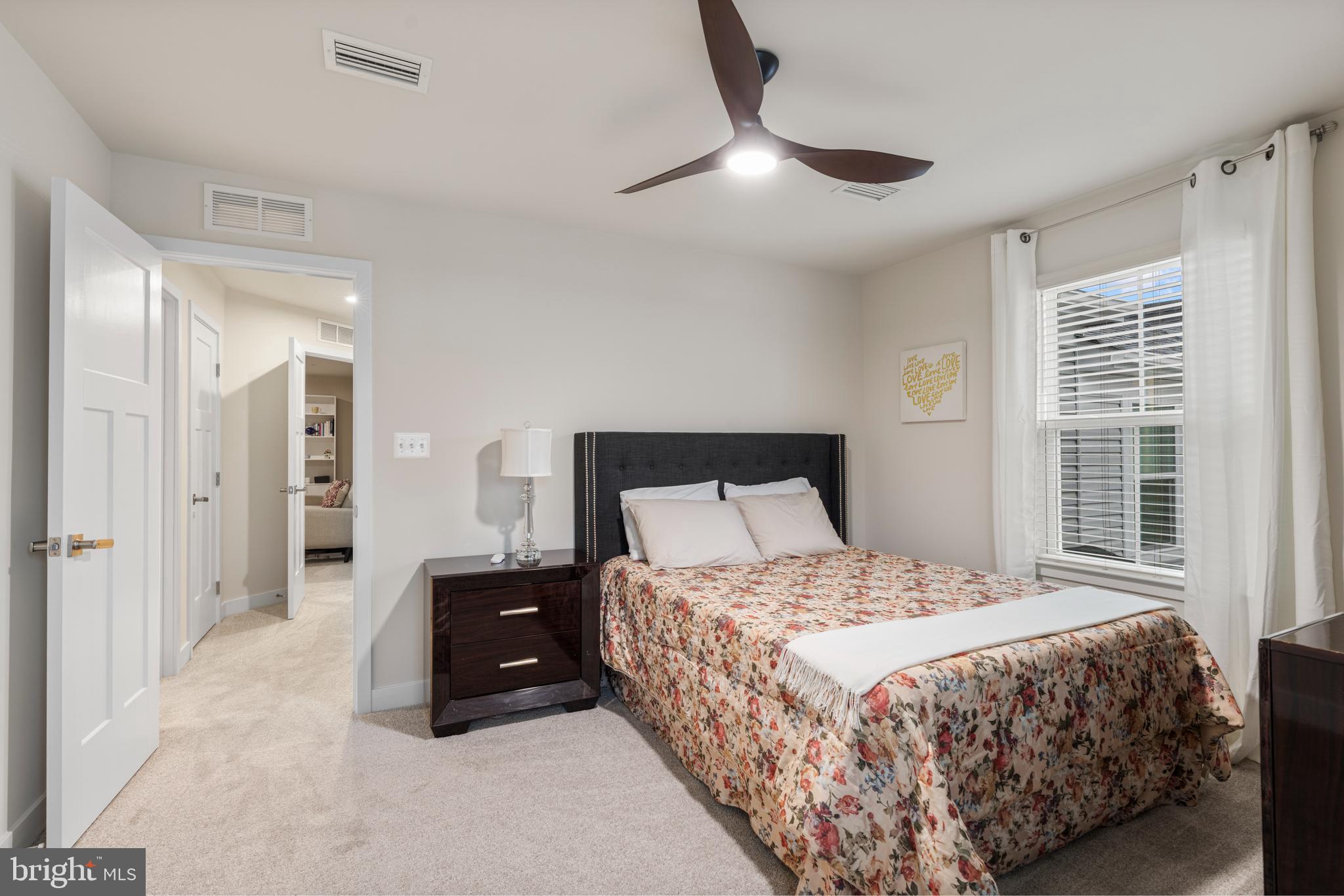952 Swilken Bridge Road Aberdeen, MD 21001 - Photo 25 of 39 a bedroom with a bed and a large mirror
