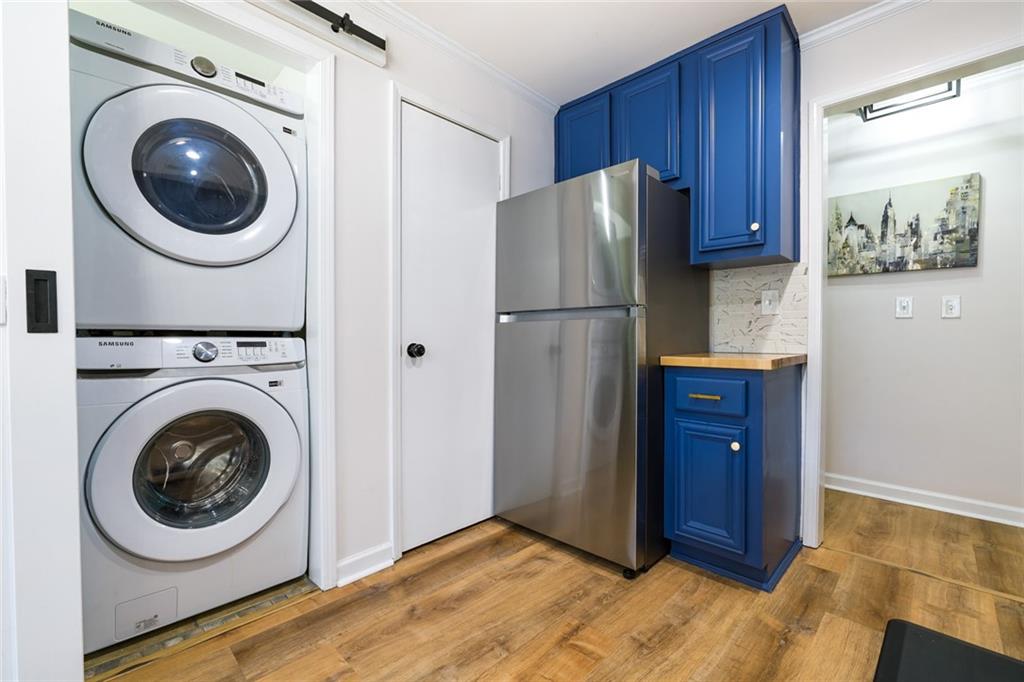 404 Countryside Place Smyrna, GA 30080 - Photo 15 of 36 a view of a kitchen with washer and dryer