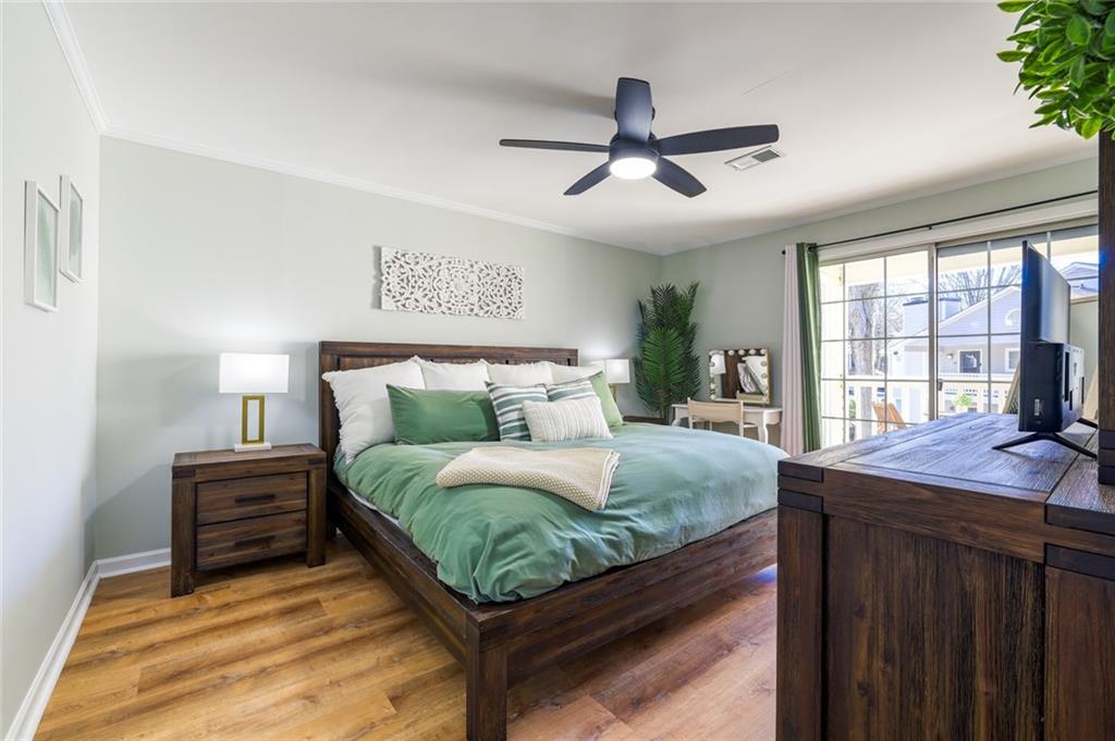 404 Countryside Place Smyrna, GA 30080 - Photo 17 of 36 a bedroom with a bed and window