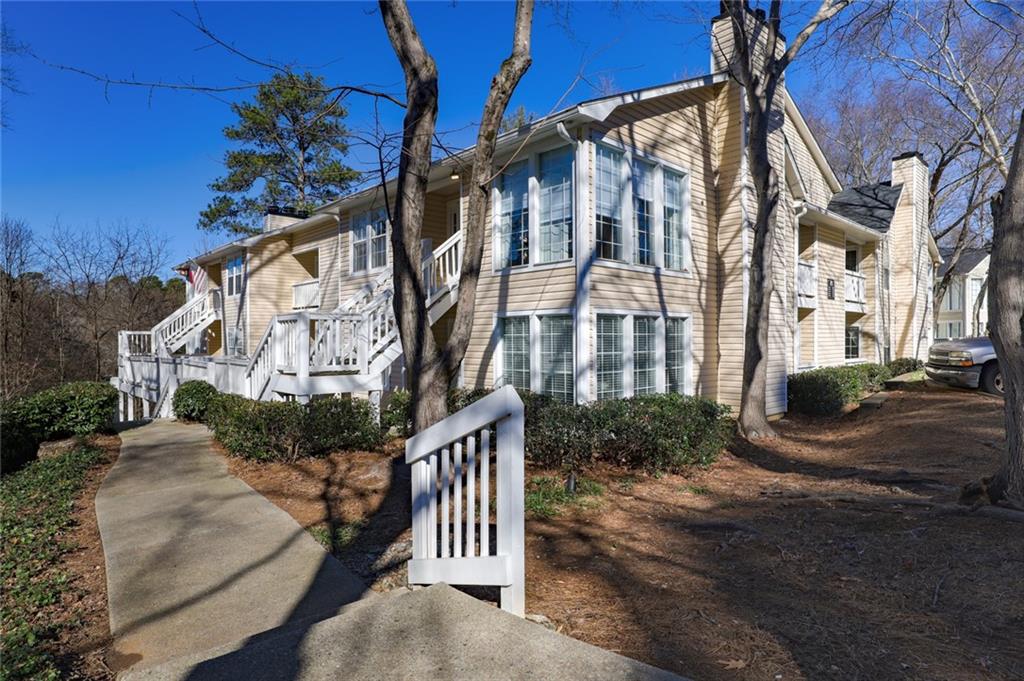 404 Countryside Place Smyrna, GA 30080 - Photo 30 of 36 a view of a building with a yard