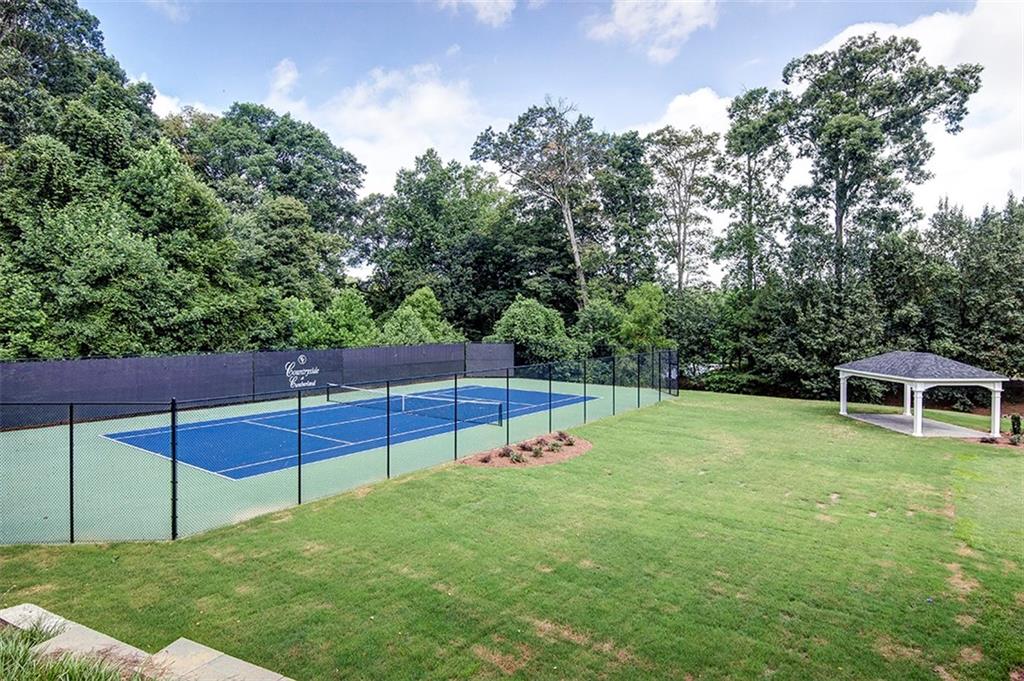 404 Countryside Place Smyrna, GA 30080 - Photo 32 of 36 a view of a backyard with a bench