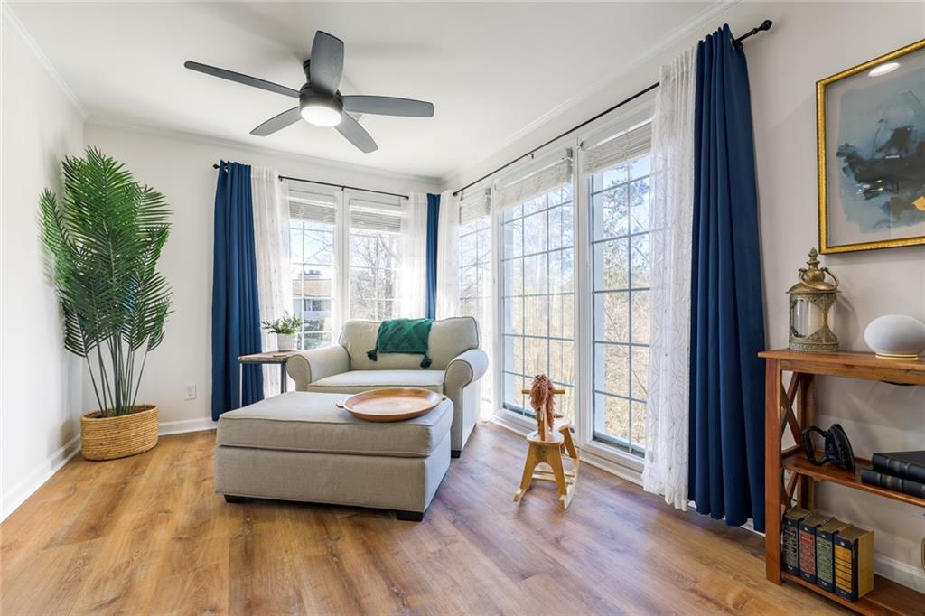 404 Countryside Place Smyrna, GA 30080 - Photo 5 of 36 a living room with furniture and a flat screen tv