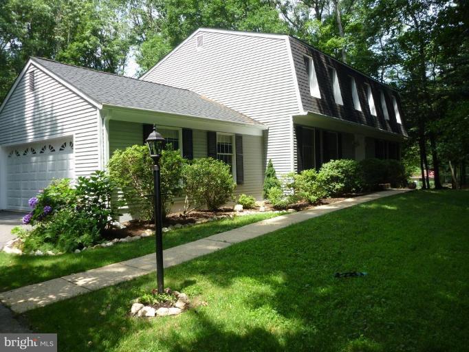 11615 Foxclove Road Reston, VA 20191 - Photo 1 of 30 a view of a house with a yard and plants