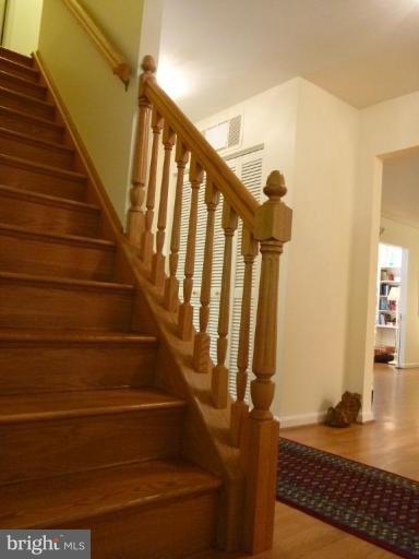 11615 Foxclove Road Reston, VA 20191 - Photo 14 of 30 a view of entryway and hall with wooden floor