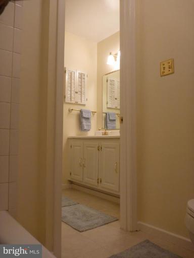 11615 Foxclove Road Reston, VA 20191 - Photo 22 of 30 a bathroom with a sink and a mirror