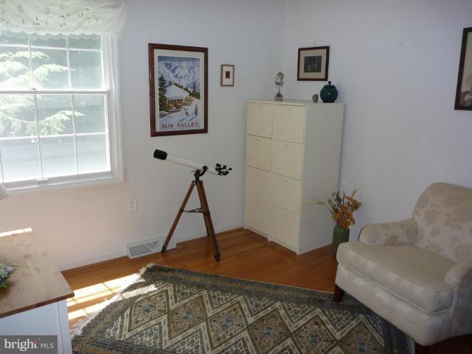 11615 Foxclove Road Reston, VA 20191 - Photo 23 of 30 a room with furniture and a window