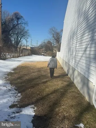 a view of a yard with a snow