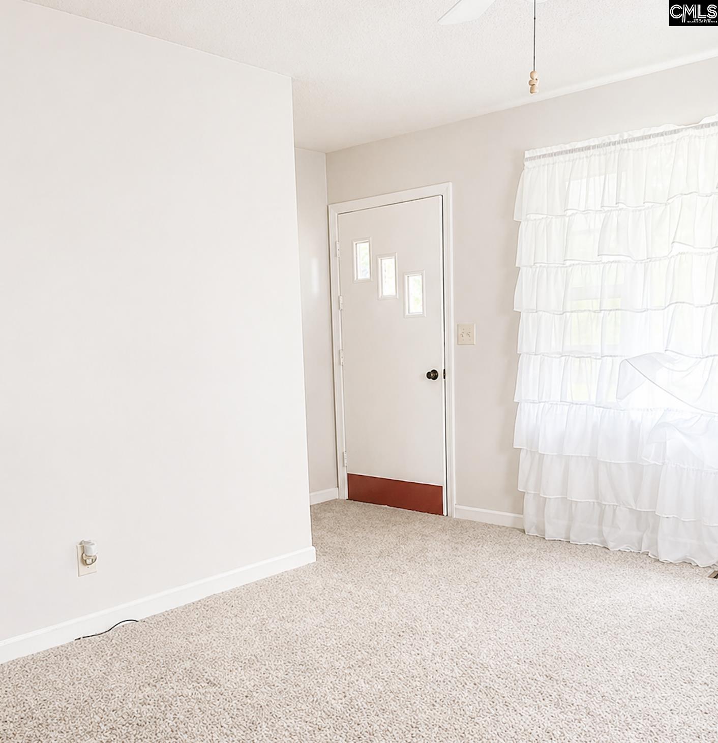 118 State Rd S-38-1224 Cordova, SC 29039 - Photo 3 of 12 a view of an empty room with a window