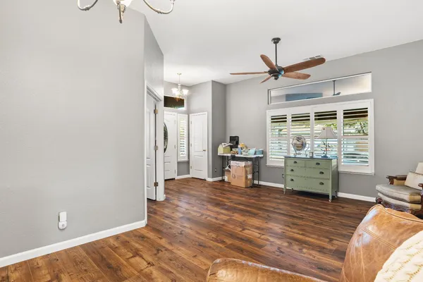 a room with furniture and a large window