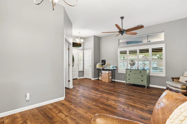 a room with furniture and a large window