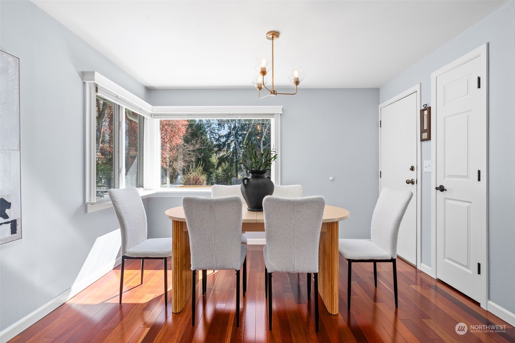 1313 North 28th Street Renton, WA 98056 - Photo 11 of 35 a view of a dining room with furniture window and wooden floor