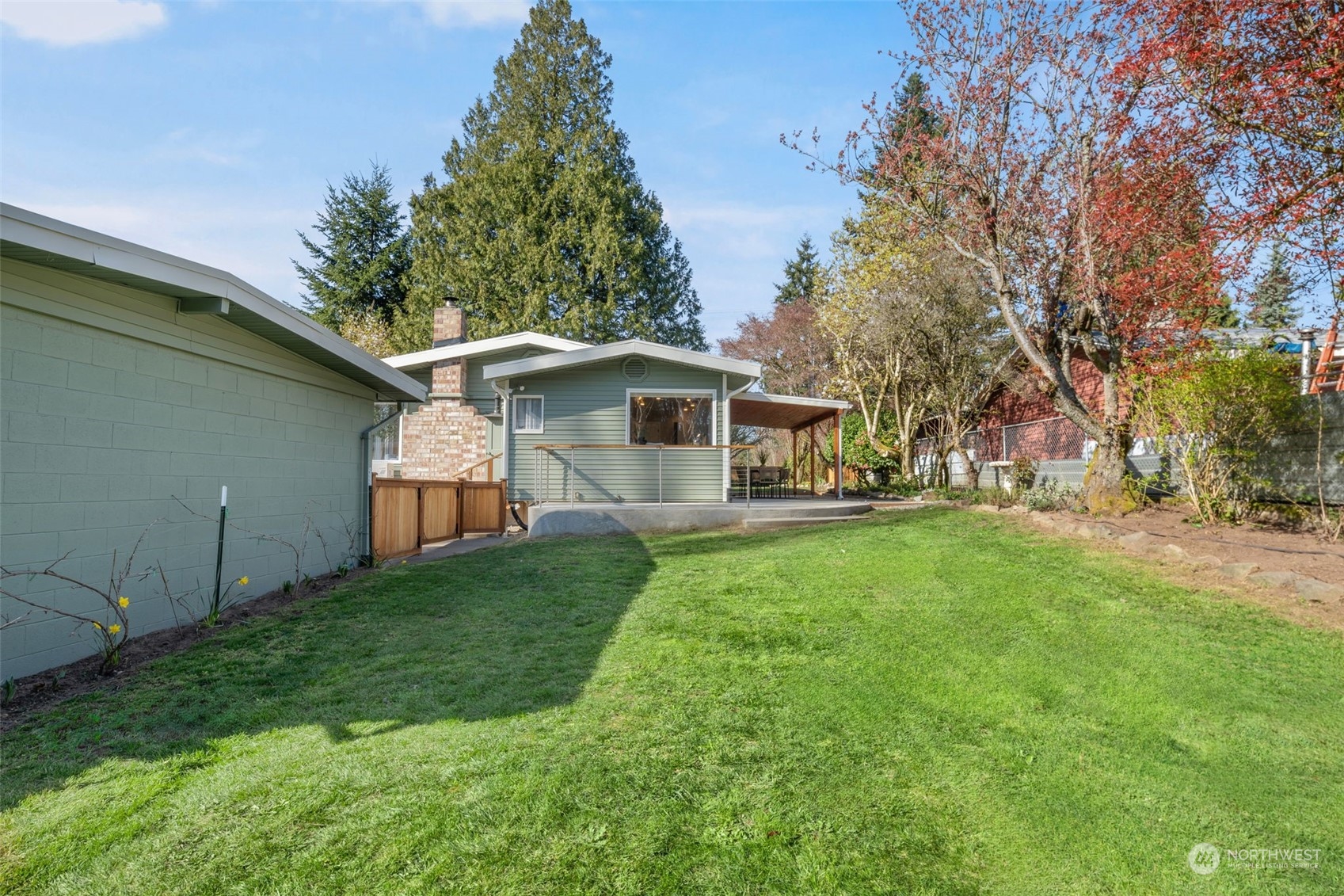 1313 North 28th Street Renton, WA 98056 - Photo 24 of 35 a front view of house with yard and green space