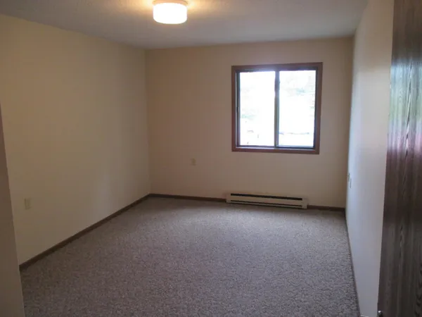 $705 | 701 North 7th Street, Unit 107, Olivia, MN 56277