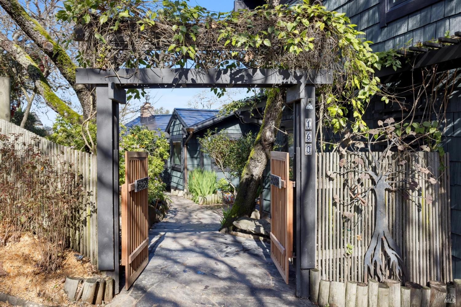 160 Crest Road Novato, CA 94945 - Photo 12 of 85 a view of a pathway with a tree
