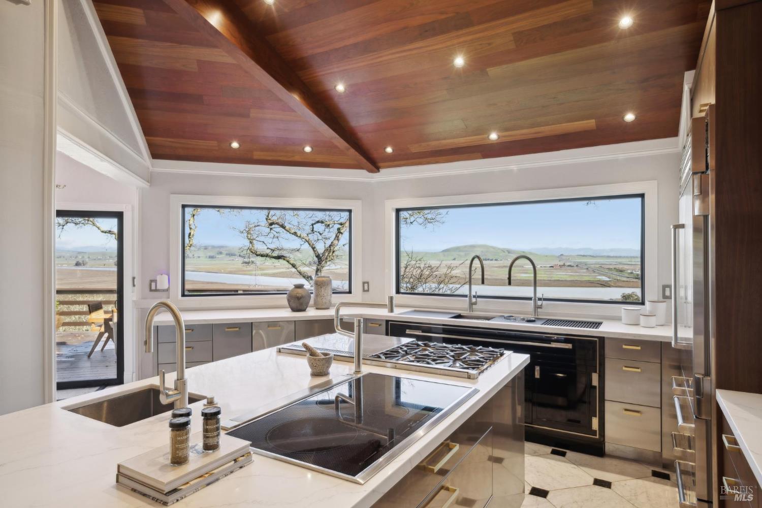 160 Crest Road Novato, CA 94945 - Photo 2 of 85 a kitchen with a sink and wooden floor