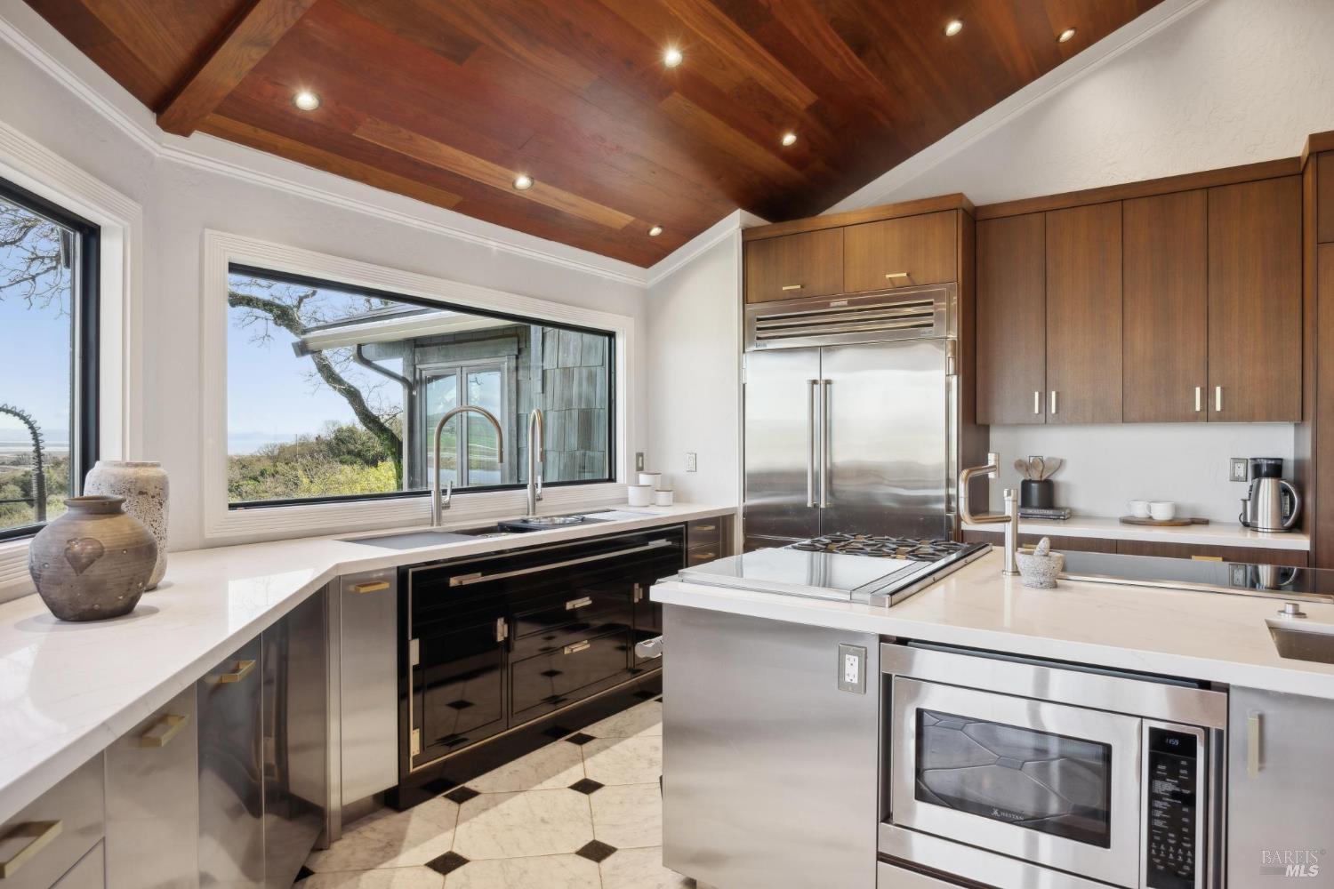 160 Crest Road Novato, CA 94945 - Photo 31 of 85 a kitchen with a sink appliances and cabinets