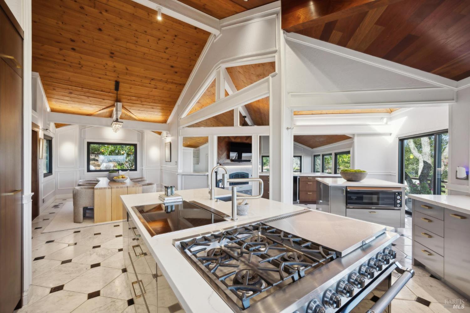 160 Crest Road Novato, CA 94945 - Photo 35 of 85 a large kitchen with a table and chairs