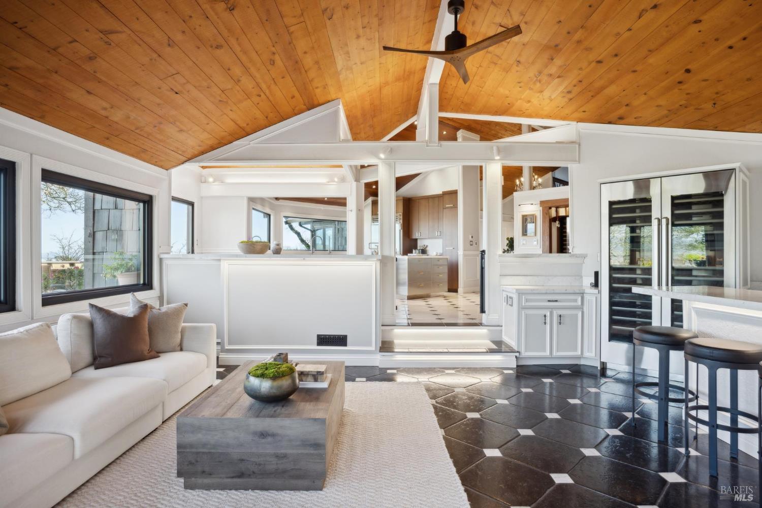 160 Crest Road Novato, CA 94945 - Photo 43 of 85 a view of a patio with couches chairs and wooden floor
