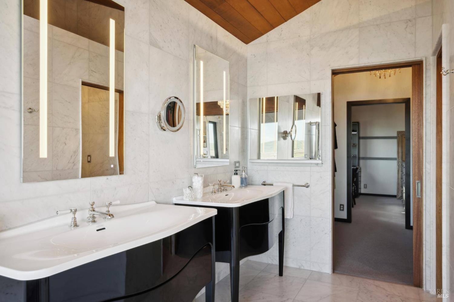 160 Crest Road Novato, CA 94945 - Photo 60 of 85 a bathroom with a sink and a mirror