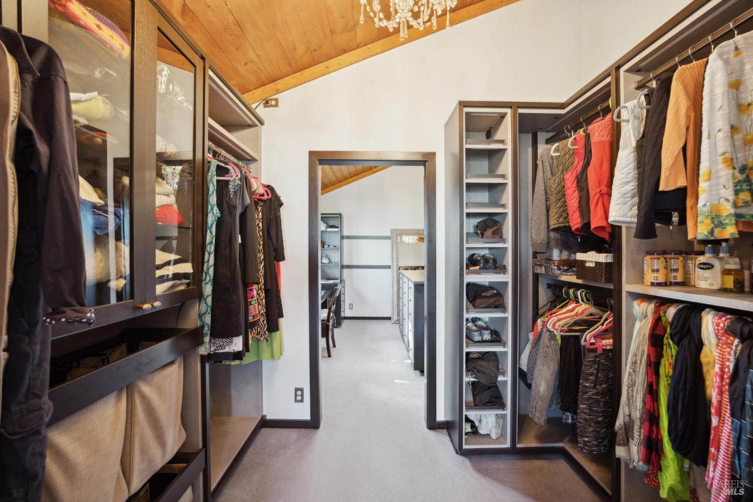 160 Crest Road Novato, CA 94945 - Photo 61 of 85 a view of walk in closet with clothes and shoes