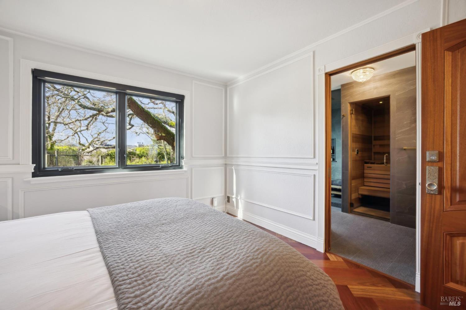 160 Crest Road Novato, CA 94945 - Photo 64 of 85 a bedroom with a bed and a painting on the wall
