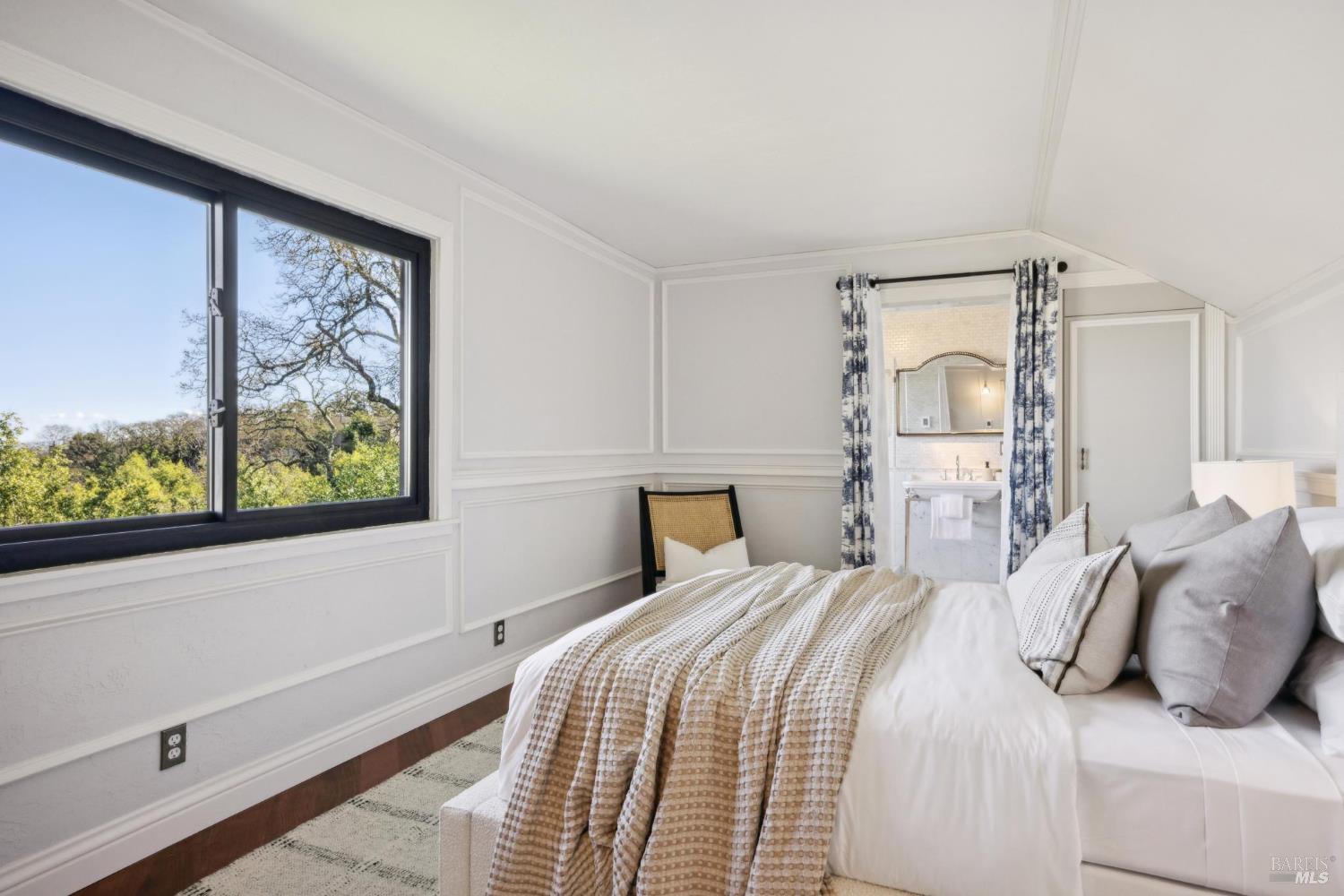 160 Crest Road Novato, CA 94945 - Photo 67 of 85 a bedroom with a large bed and a window