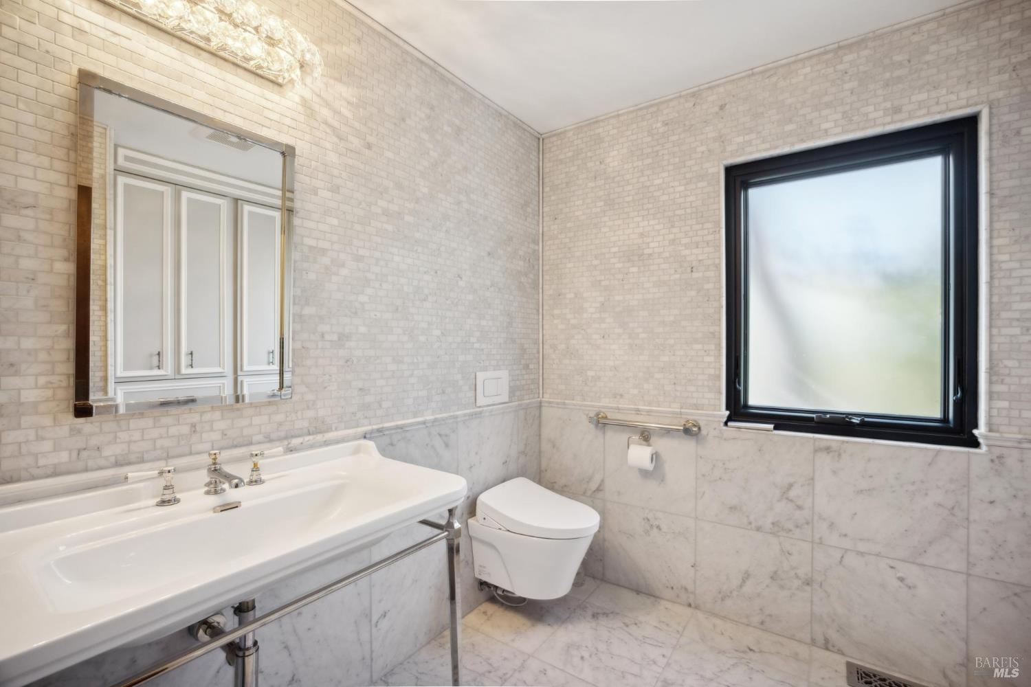 160 Crest Road Novato, CA 94945 - Photo 71 of 85 a bathroom with a sink a toilet and mirror
