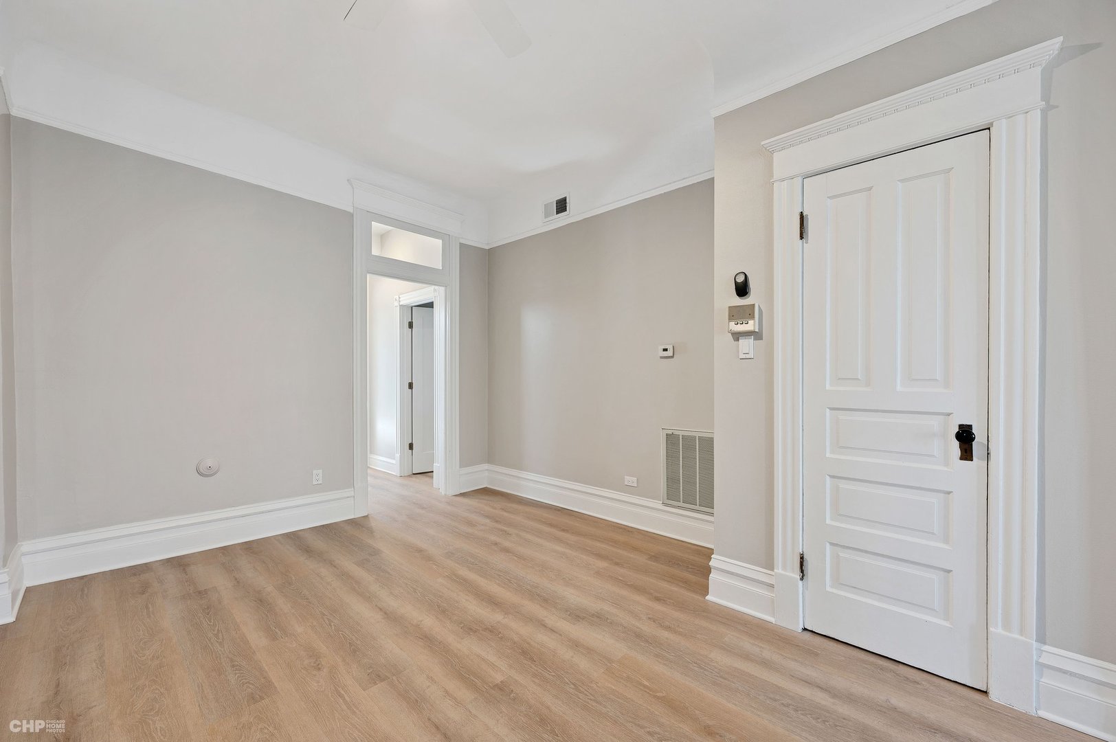 843 West Newport Avenue, Unit 2 Chicago, IL 60657 - Photo 6 of 26 wooden floor in an empty room