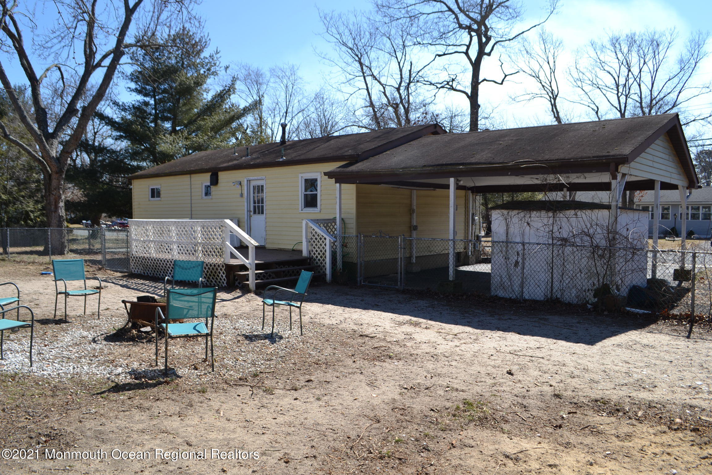 18 Castle Avenue Jackson, NJ 08527 - Photo 19 of 19 a view of backyard with outdoor seating and trees