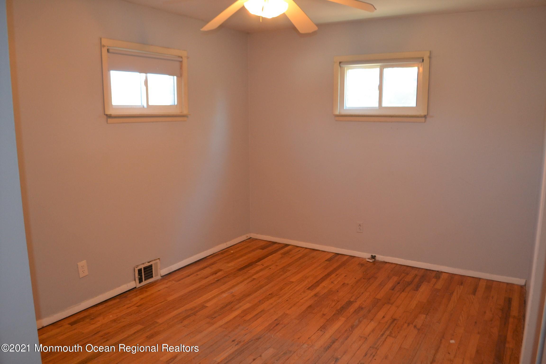 18 Castle Avenue Jackson, NJ 08527 - Photo 9 of 19 an empty room with a window