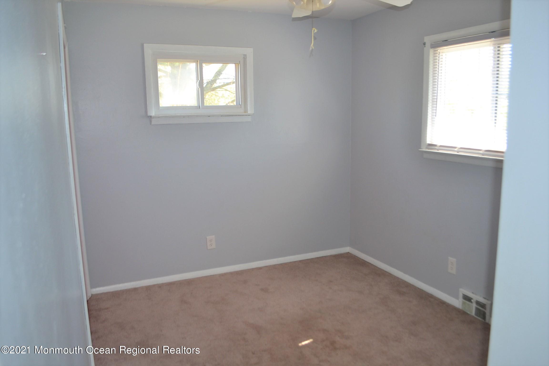 18 Castle Avenue Jackson, NJ 08527 - Photo 10 of 19 an empty room with a window