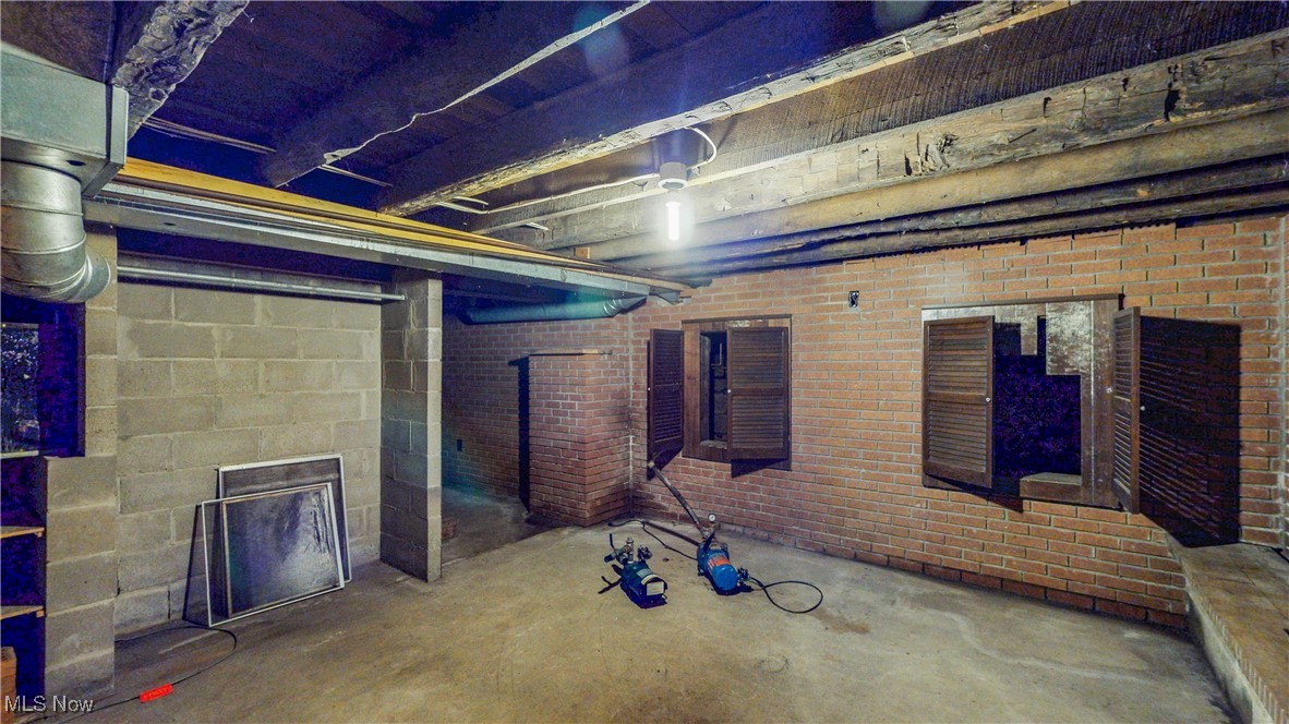 1811 Randolph Road Mogadore, OH 44260 - Photo 13 of 17 Unfinished basement are w/access to pump, etc.