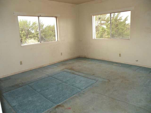 4674 Damron Valley Road Snowflake, AZ 85937 - Photo 15 of 19 an empty room with windows