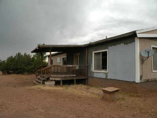 4674 Damron Valley Road Snowflake, AZ 85937 - Photo 19 of 19 an outdoor view of house with backyard
