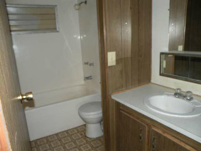 4674 Damron Valley Road Snowflake, AZ 85937 - Photo 2 of 19 a bathroom with a sink a toilet and shower