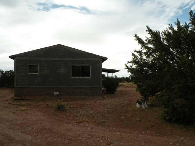 4674 Damron Valley Road Snowflake, AZ 85937 - Photo 9 of 19 a backyard of a house with lots of green space
