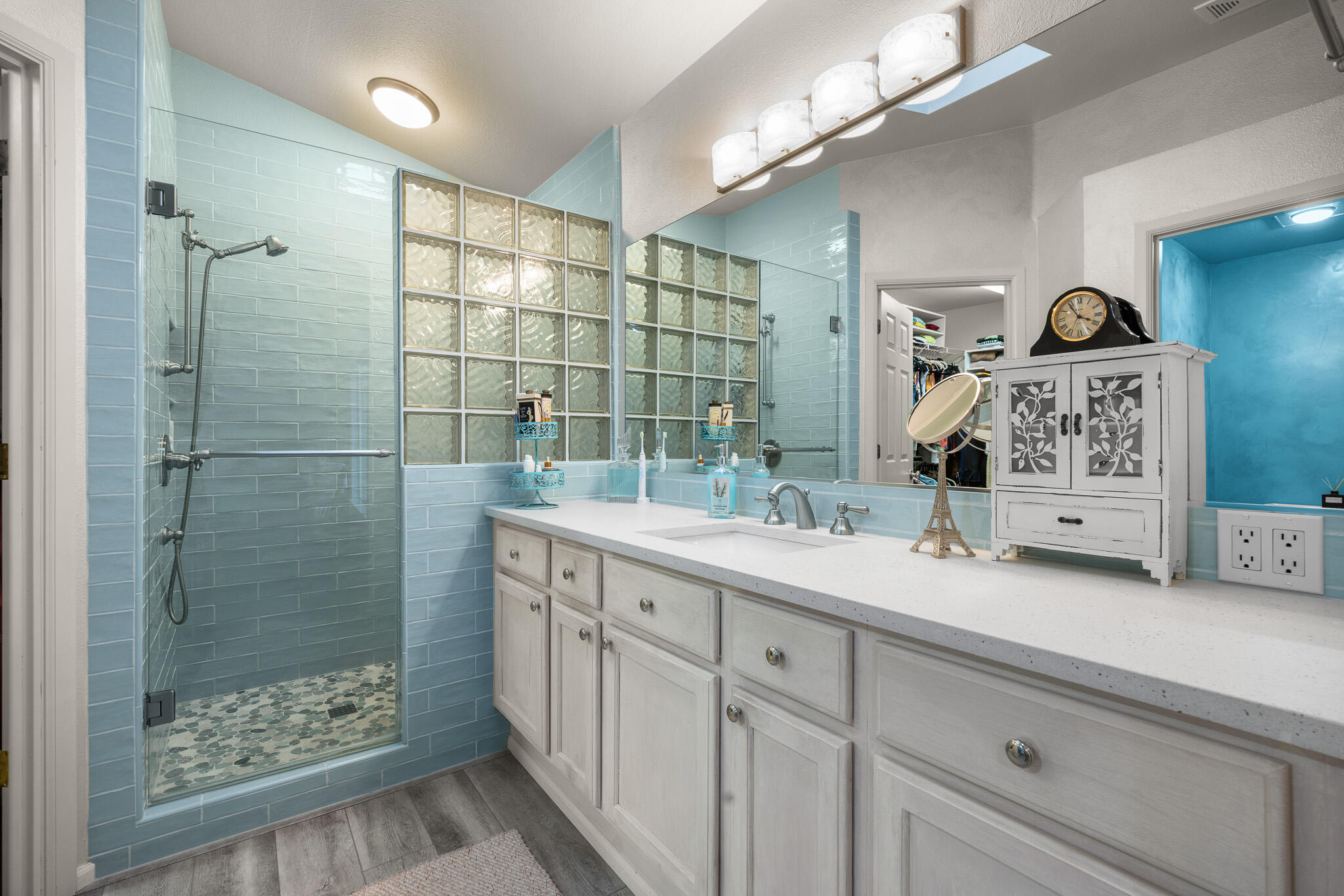 624 Southwest Hill Street Bend, OR 97702 - Photo 23 of 45 a bathroom with a double vanity sink mirror and shower