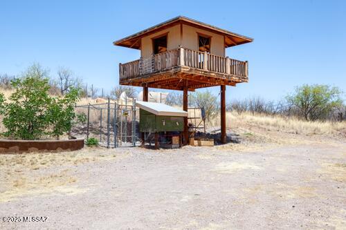 480 Camino Ramanote Rio Rico, AZ 85648 - Photo 30 of 43 Backyard playhouse.