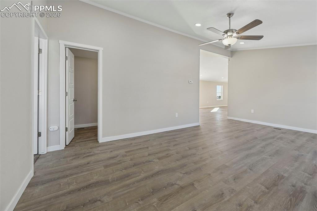 6315 Peerless Farms Road Peyton, CO 80831 - Photo 15 of 49 wooden floor in an empty room