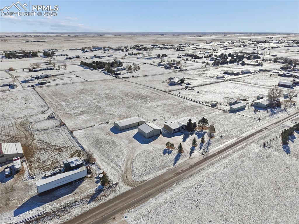 6315 Peerless Farms Road Peyton, CO 80831 - Photo 35 of 49 an aerial view of a ocean beach