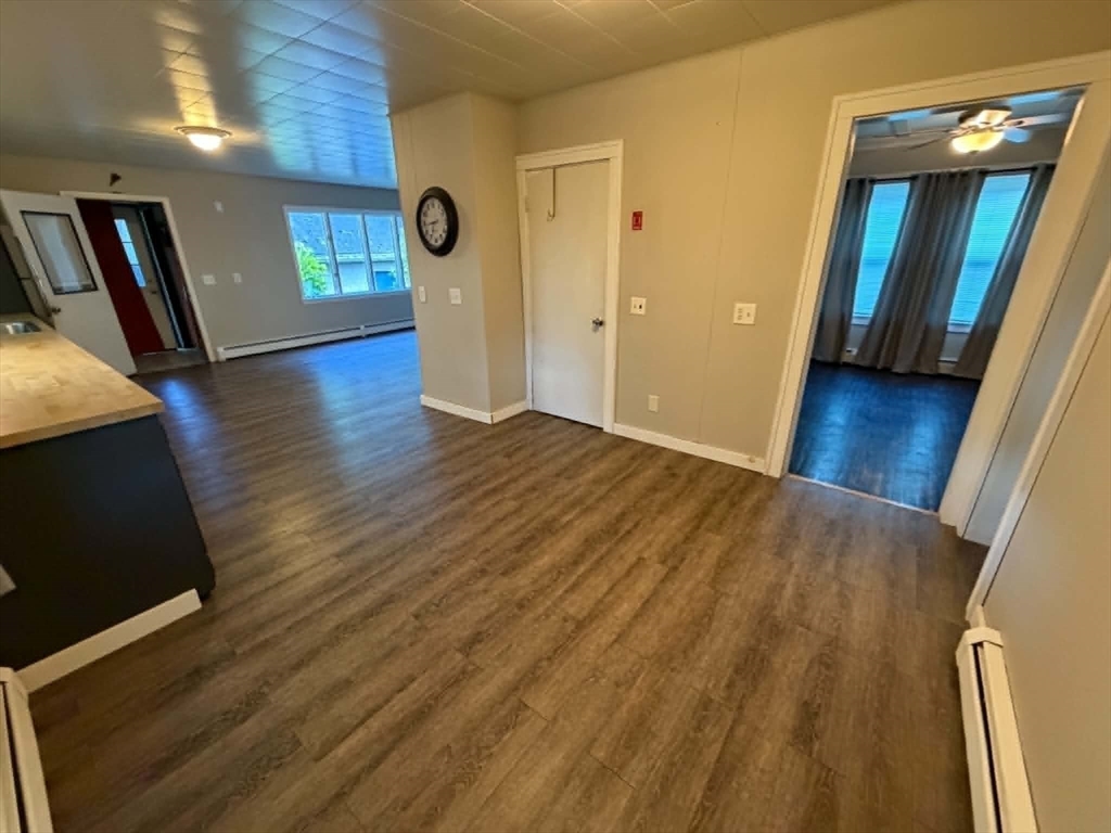 280 State Road North Adams, MA 01247 - Photo 14 of 35 a view of an empty room with wooden floor and a window