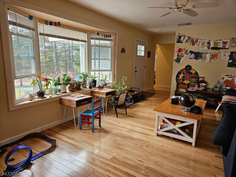 106 Lake Wallkill Road Vernon, NJ 07461 - Photo 14 of 24 a view of a workspace with furniture and a window