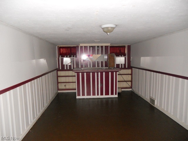 3946 Bushnell Road University Heights, OH 44118 - Photo 12 of 12 Recreation Room with Wet Bar and Built-in Shelves