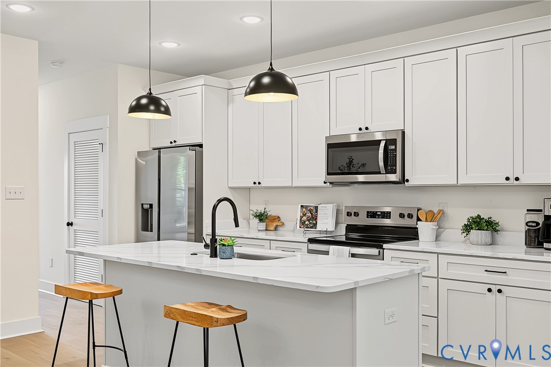 3601.5 Decatur Street Richmond, VA 23224 - Photo 15 of 32 Kitchen featuring an island with an undermount sin