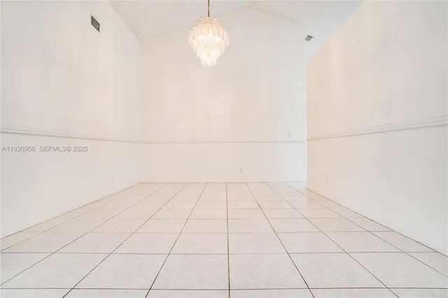 a view of a room with an empty space