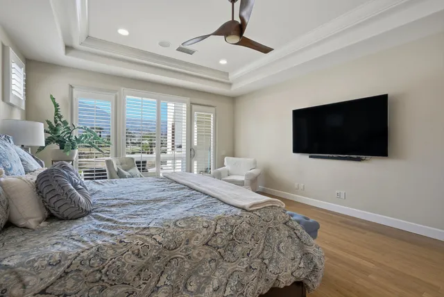 a spacious bathroom with a double vanity sink and a mirror